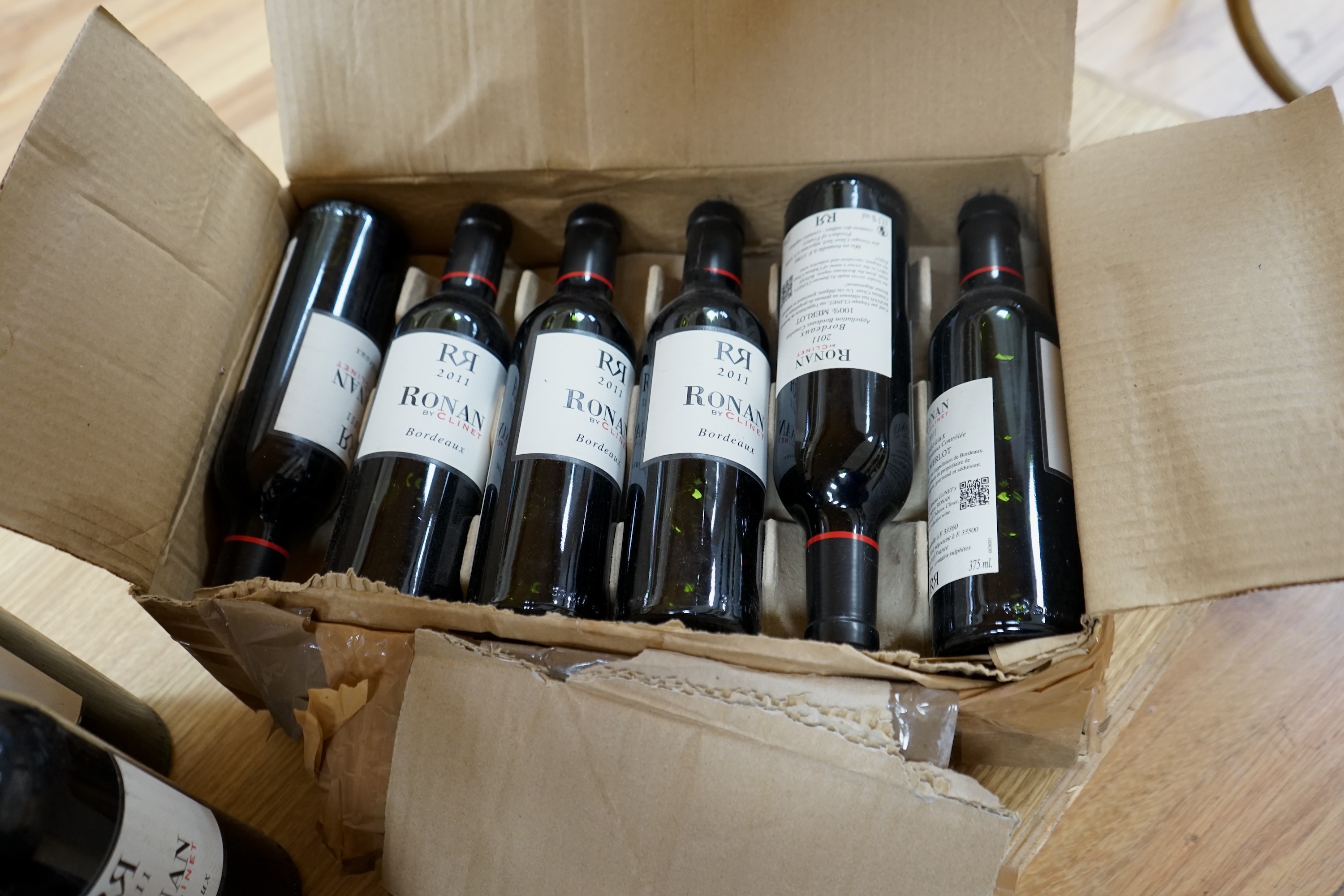 Twenty seven bottles (24 35cl and 3 75cl) of 2011 Ronan by Clinet Bordeaux wine. Condition - storage unknown